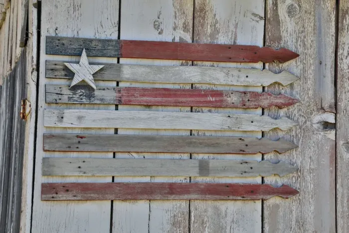 Framed Print : Flag on side of old wooden shed, Benge, Washington State