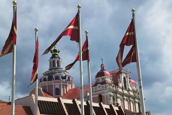 Flag poles and church spires in Town Hall Square, Vilnius, Lithuania