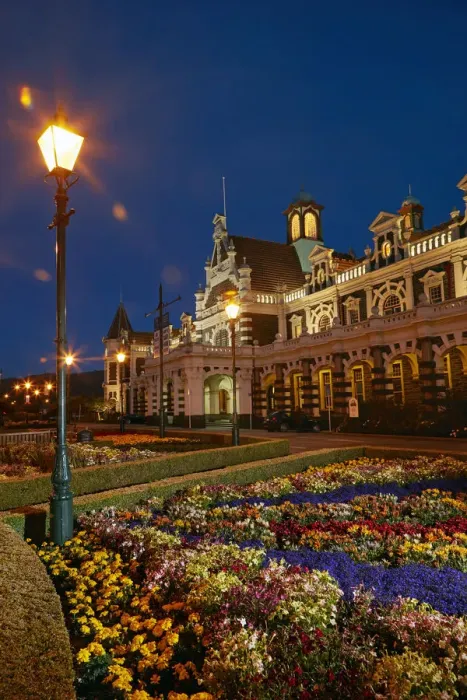 Framed Print : Flower garden and historic Railway Station at night, Dunedin, South Island, New Zealand Framed Print : Flower garden and historic Railway Station at night, Dunedin, South Island, New Zealand