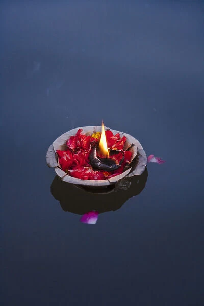 Flower lamp on the Ganges River, Varanasi, India