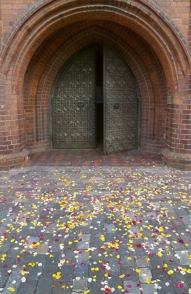 Flower petals fallen on the street outside gate of St. Annes Church, Vilnius