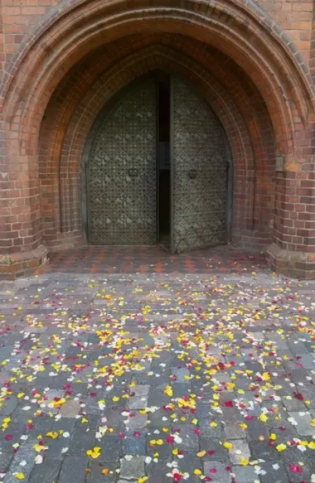 Framed Print : Flower petals fallen on the street outside gate of St. Annes Church, Vilnius Framed Print : Flower petals fallen on the street outside gate of St. Annes Church, Vilnius