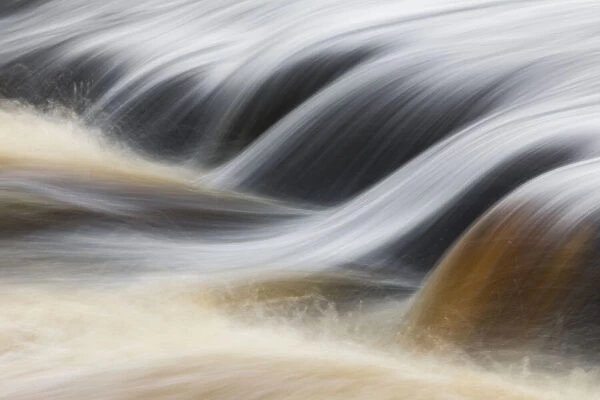 Flowing tea colored water from tannins, Tahquamenon River, Tahquamenon Falls State Park