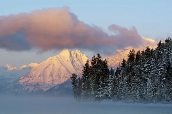 Framed Print : Fog rises from Lake McDonald on a very cold afternoon in Glacier National Park in Montana