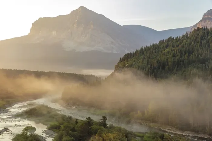 Framed Print : Fog at sunrise along Swiftcurrent Creek in Glacier National Park, Montana, USA