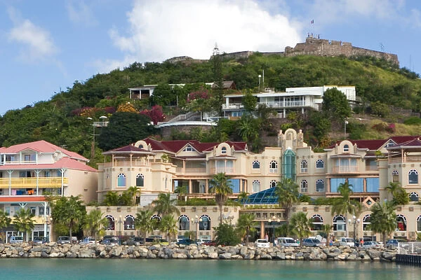 Fort St. Louis sits atop a hill above a modern day luxury shopping mall in Marigot, St