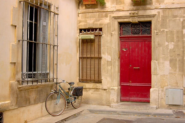 03. France, Arles, Provence, bicycle parked along building