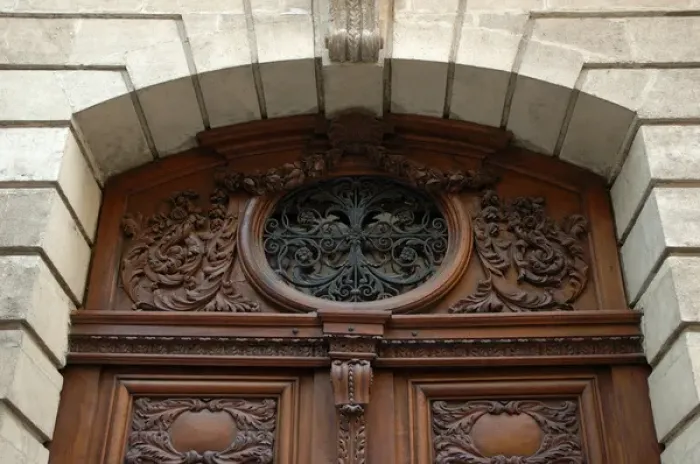 Framed Print : 03. France, Avignon, Provence, ornately carved wooden doors with oval iron work Framed Print : 03. France, Avignon, Provence, ornately carved wooden doors with oval iron work