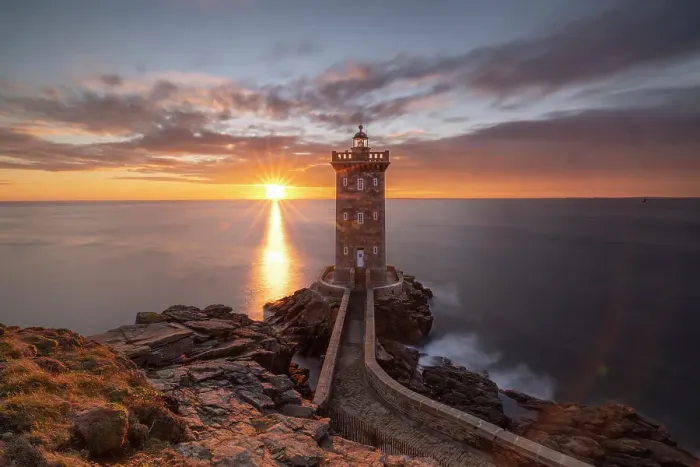 Framed Print : France, Brittany, Le Conquet. Sun setting at the Kermorvan Lighthouse Framed Print : France, Brittany, Le Conquet. Sun setting at the Kermorvan Lighthouse
