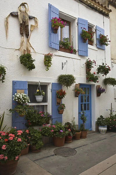 France, Camargue, Saintes-Maries-de-la-Mer. Colorful homes line the quaint streets
