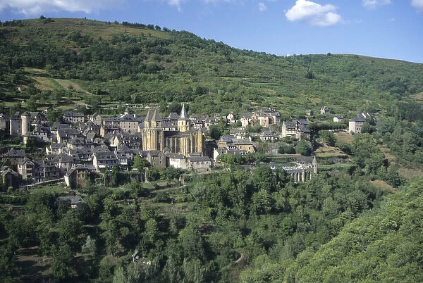 France: Conques, scenic view of Benedictine Abbey Church of Sainte-Foy and town nestled
