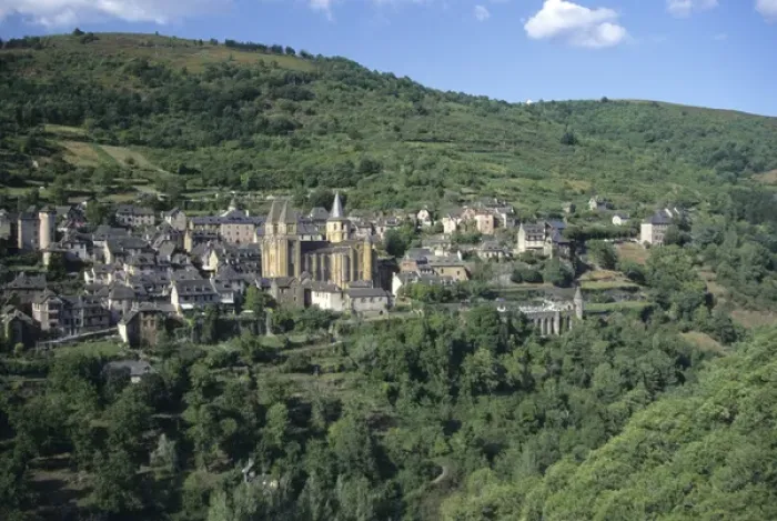 Framed Print : France: Conques, scenic view of Benedictine Abbey Church of Sainte-Foy and town nestled Framed Print : France: Conques, scenic view of Benedictine Abbey Church of Sainte-Foy and town nestled