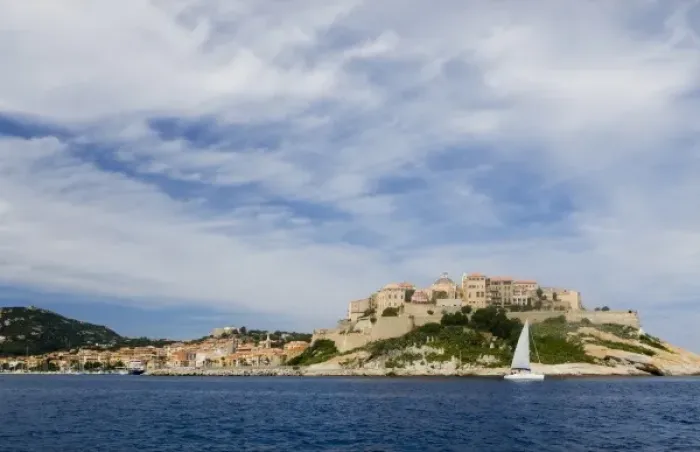 Framed Print : France, Corsica. Cirrus clouds above old city at Calvi within the walls of the historic
