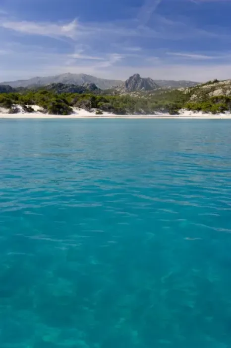 Framed Print : France, Corsica. Clear water and white sand at Saleccio Beach below rugged terrain of DA