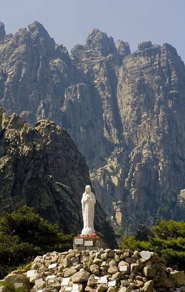 France, Corsica. Shrine to Our Lady of the Snows at Col de Bavella below pinnacles