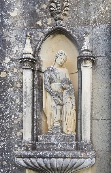 France, Corsica. Statue flanking door to mausoleum adjacent to Cathedral of Nebbio