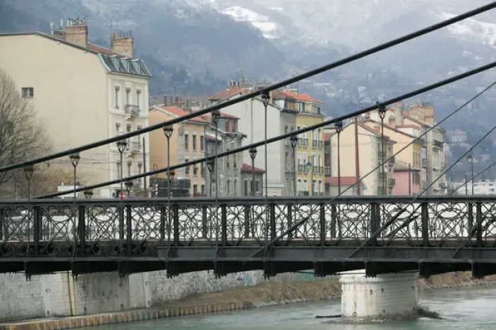 Framed Print : FRANCE-French Alps (Isere)-GRENOBLE: Footbridge on the Isere River  /  Winter