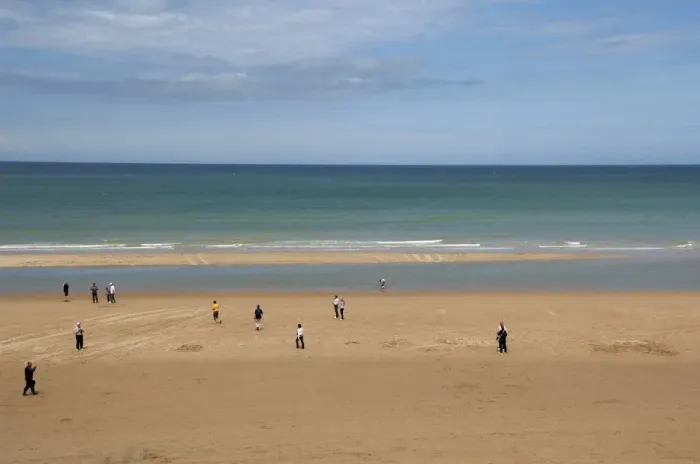 Framed Print : France, Normandy, Saint-Laurent-Sur-Mer, Omaha Beach. Tourists walking on historic Framed Print : France, Normandy, Saint-Laurent-Sur-Mer, Omaha Beach. Tourists walking on historic