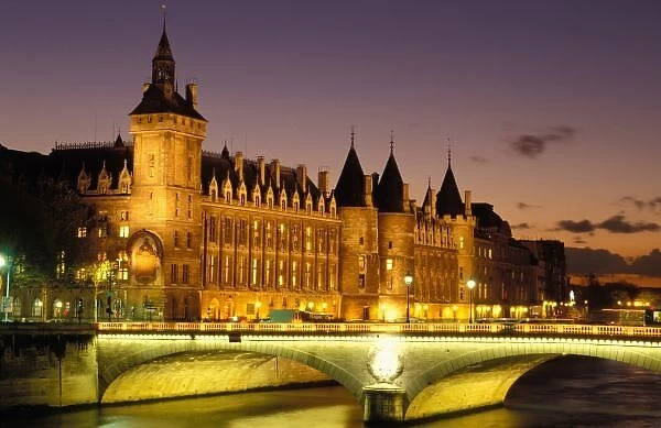 France, Paris, Conciergerie and river Seine at dusk