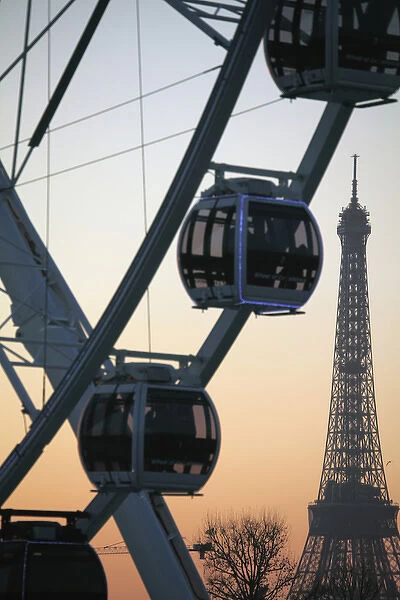 France. Paris. Ferry wheel in Place de la concorde with Eiffel Tower in the background