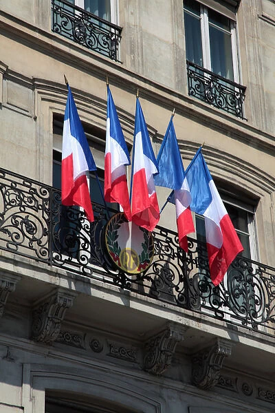 France. Paris. French national flags on a buiding