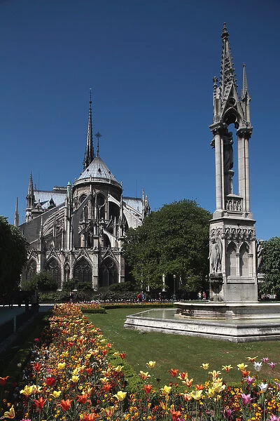 France. Paris. The back garden and the rear view of Notre Dame Cathedral