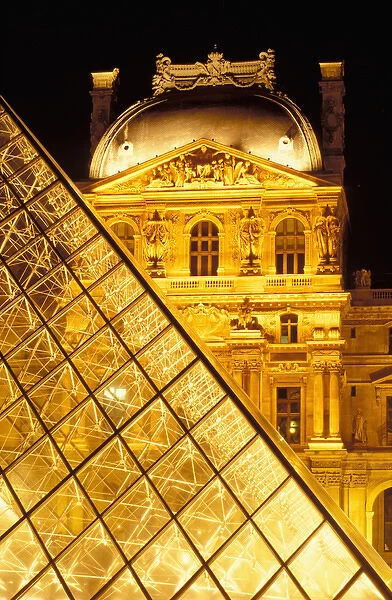 France, Paris, Louvre museum and Pei Pyramid by night