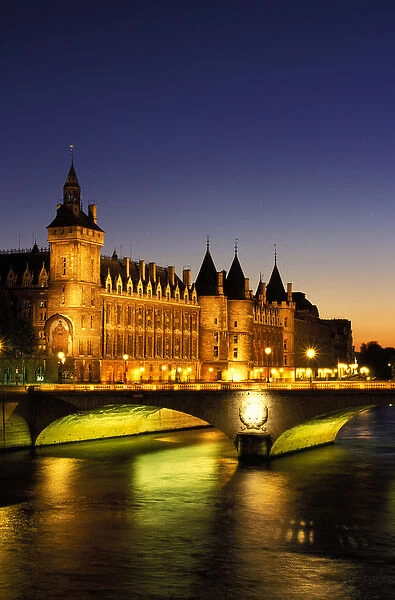 France, Paris, River Seine and Conciergerie at dusk