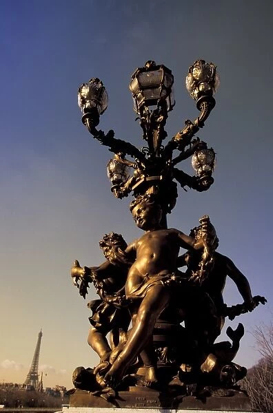 France, Paris. Statue and lamp on Pont Alexandre III