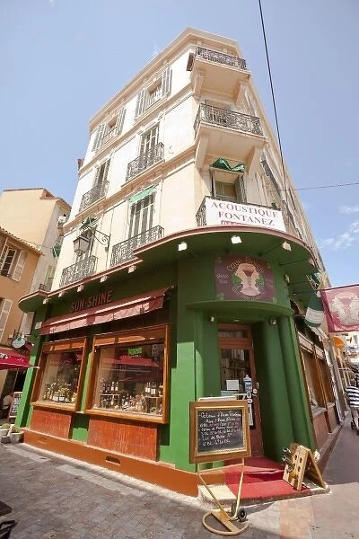 France, Provence, Cannes. Corner building with shop on first floor. Credit as: Fred