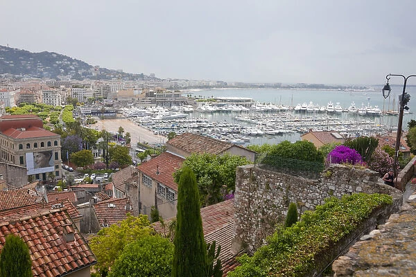 France, Provence, Cannes. Overview of harbor and marina on rainy day. Credit as