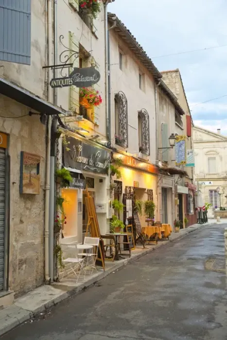 Framed Print : France, Provence, St. Remy-de-Provence. Shops and restaurants line the street. Credit as Framed Print : France, Provence, St. Remy-de-Provence. Shops and restaurants line the street. Credit as