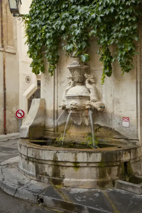 Framed Print : France, Provence, St. Remy-de-Provence. Water fountain on street corner. Credit as Framed Print : France, Provence, St. Remy-de-Provence. Water fountain on street corner. Credit as