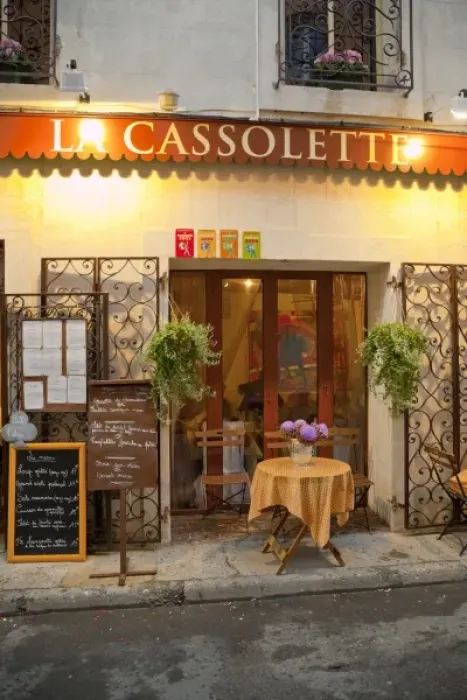 Framed Print : France, Provence, St. Remy-de-Provence. Exterior of restaurant at night
