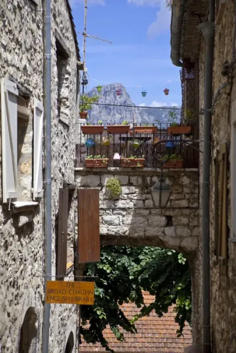 Framed Print : France, Provence, Vence. Sign for an English library outside an old building. Credit as