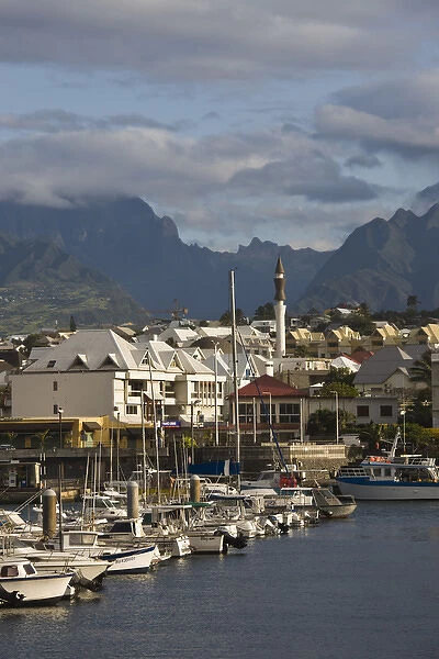 France, Reunion Island, St-Pierre, Harborfront with Cirque de Cilaos mountains in the background