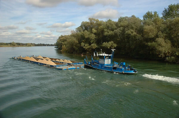 France, Saone River, barge hauling sand