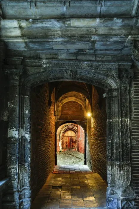 Framed Print : France, Toulouse. Tunnel leading to a courtyard