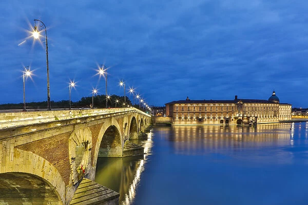 France, Toulouse. View of Pont Neuf and the Garonne River at sunset