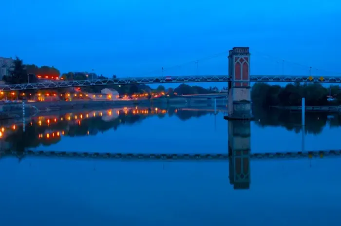 Framed Print : 03. France, Trevoux, a bridge over the Saone River at dusk