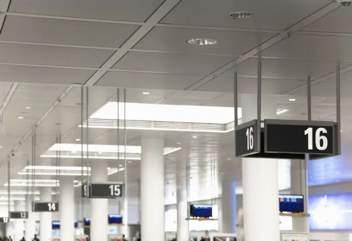 Framed Print : Frankfurt, Brandenburg, Germany - Gate numbers are hanging from the ceiling in an airport