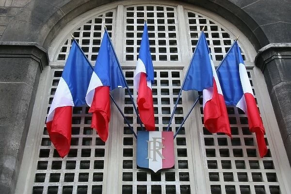 French Flag. Facade of Justice Palace. Paris, France