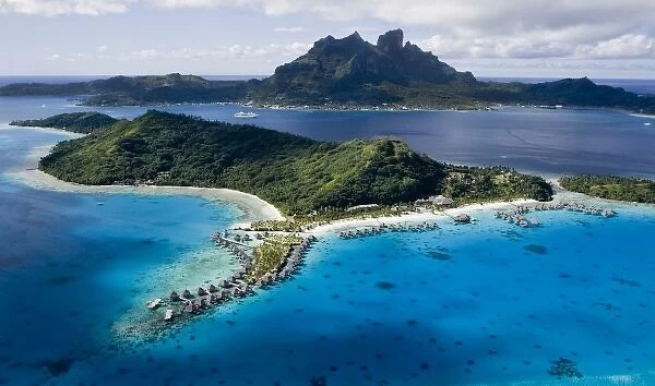 French Polynesia, Bora Bora. Aerial view of islands with Paul Gaugin cruise ship in background