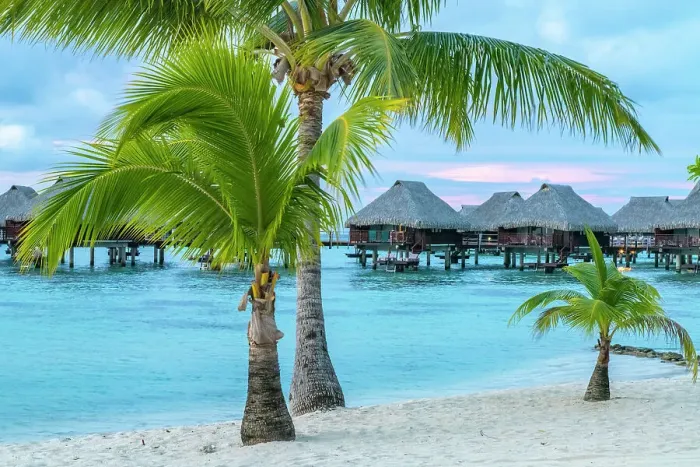 Framed Print : French Polynesia, Moorea. Overwater bungalows