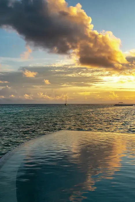 Framed Print : French Polynesia, Rangiroa Atoll. Infinity pool and sailboat at sunset. ©Cathy & Gordon Illg / Jaynes Gallery / DanitaDelimont.com Framed Print : French Polynesia, Rangiroa Atoll. Infinity pool and sailboat at sunset. ©Cathy & Gordon Illg / Jaynes Gallery / DanitaDelimont.com