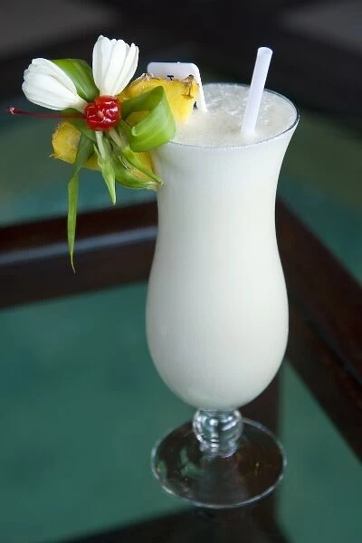 French Polynesia, Society Islands, Rangiroa. Close-up of pina colada drink garnished with fruit