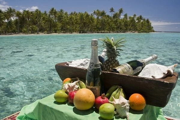 French Polynesia, Society Islands, Taha a. An assortment of fruits and champagne