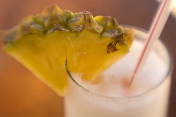 French Polynesia. Tropical drink with pineapple garnish
