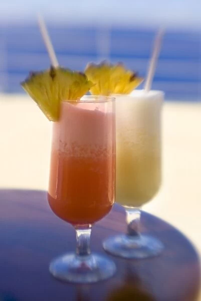 French Polynesia. Tropical drinks with pineapple garnish