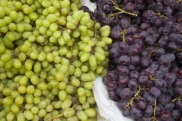 Fresh ripe grapes on display at market